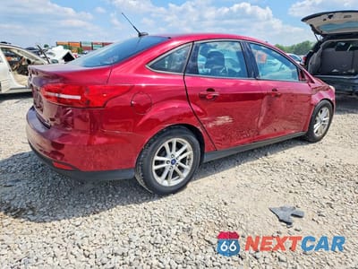 Trzecie zdjęcie samochodu z tyłu: 2016 FORD FOCUS SE VIN:1FADP3F25GL220627 - miniatura