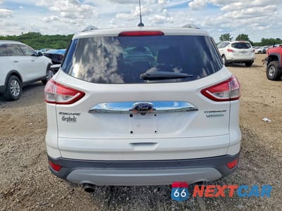 Zdjęcie 6 z 13 samochodu: 2014 FORD ESCAPE TITANIUM VIN:1FMCU0J95EUA99571 - miniatura