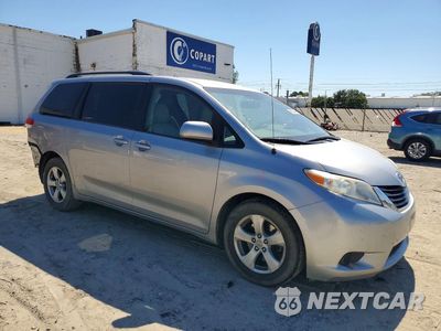 Czwarte zdjęcie samochodu z boku: 2011 TOYOTA SIENNA LE VIN:5TDKK3DCXBS003612 - miniatura