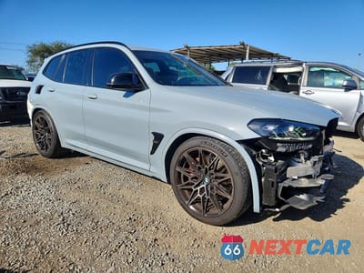 Czwarte zdjęcie samochodu z boku: 2022 BMW X3 M VIN:5YM13EC01N9K66769 - miniatura