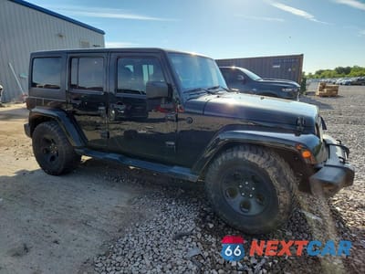 Czwarte zdjęcie samochodu z boku: 2014 JEEP WRANGLER UNLIMITED SAHARA VIN:1C4BJWEG9EL118388 - miniatura