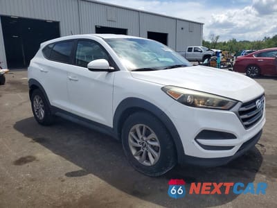 Czwarte zdjęcie samochodu z boku: 2017 HYUNDAI TUCSON SE VIN:KM8J23A43HU386432 - miniatura