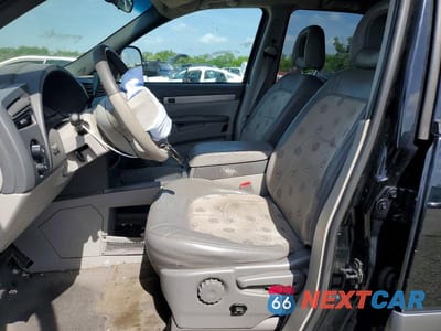 Zdjęcie 12 z 14 samochodu: 2002 BUICK RENDEZVOUS CX VIN:3G5DA03E32S600715 - miniatura