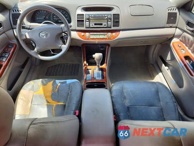 Zdjęcie 8 z 12 samochodu: 2003 TOYOTA CAMRY XLE VIN:4T1BE32K83U722335 - miniatura