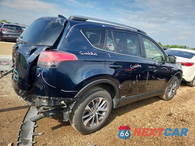 Trzecie zdjęcie samochodu z tyłu: 2018 TOYOTA RAV4 HYBRID LE VIN:JTMRJREVXJD254340 - miniatura