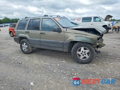 Czwarte zdjęcie samochodu z boku: 1997 JEEP GRAND CHEROKEE VIN:1J4GZ58Y1VC709046 - miniatura