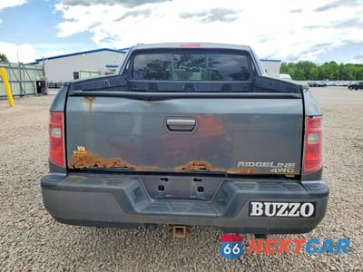 Zdjęcie 6 z 12 samochodu: 2010 HONDA RIDGELINE RTL VIN:5FPYK1F51AB004820 - miniatura