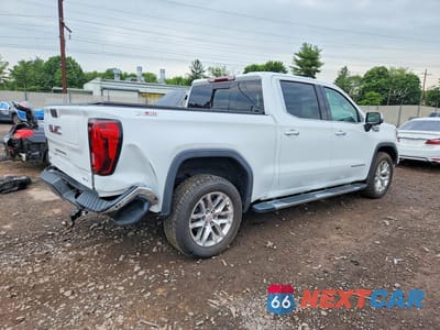 Trzecie zdjęcie samochodu z tyłu: 2022 GMC SIERRA LIMITED K1500 SLT VIN:3GTU9DEDXNG141154 - miniatura