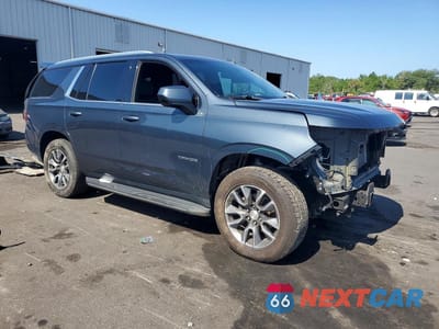 Czwarte zdjęcie samochodu z boku: 2021 CHEVROLET TAHOE C1500 LT VIN:1GNSCNKD9MR236748 - miniatura