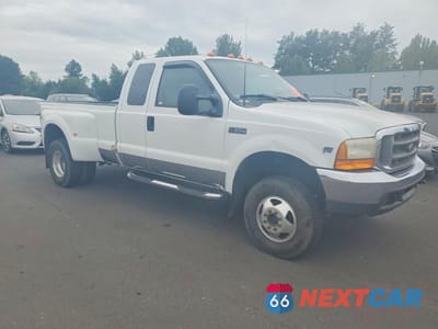 Czwarte zdjęcie samochodu z boku: 2000 FORD F350 SUPER DUTY VIN:1FTWX33S8YED76352 - miniatura