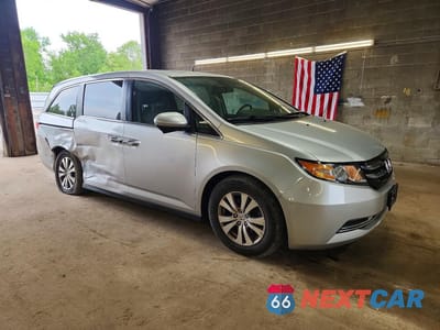 Czwarte zdjęcie samochodu z boku: 2014 HONDA ODYSSEY EXL VIN:5FNRL5H68EB137474 - miniatura