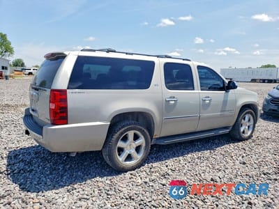 Trzecie zdjęcie samochodu z tyłu: 2009 CHEVROLET SUBURBAN K1500 LTZ VIN:1GNFK36309R190888 - miniatura