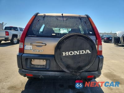 Zdjęcie 6 z 12 samochodu: 2004 HONDA CR-V LX VIN:JHLRD78444C025843 - miniatura