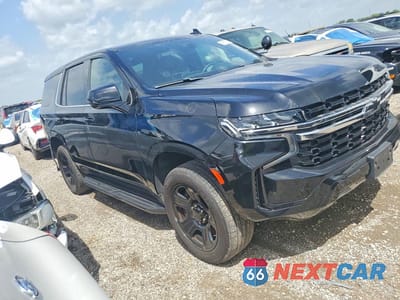 Czwarte zdjęcie samochodu z boku: 2023 CHEVROLET TAHOE C1500 VIN:1GNSCLED6PR231009 - miniatura