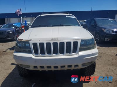 Piąte zdjęcie samochodu w środku: 1999 JEEP GRAND CHEROKEE LIMITED VIN:1J4GW68N5XC696289 - miniatura