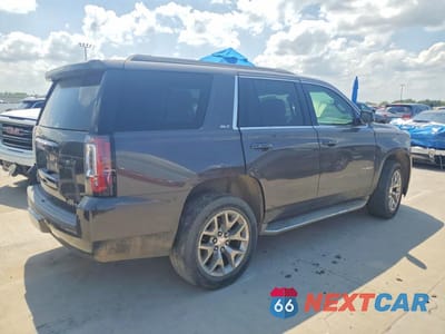 Trzecie zdjęcie samochodu z tyłu: 2015 GMC YUKON SLT VIN:1GKS1BKC9FR307717 - miniatura