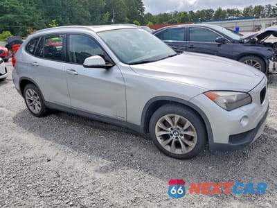 Czwarte zdjęcie samochodu z boku: 2014 BMW X1 XDRIVE28I VIN:WBAVL1C59EVY23365 - miniatura