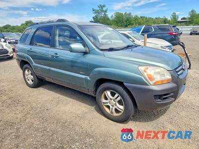 Czwarte zdjęcie samochodu z boku: 2006 KIA SPORTAGE LX VIN:KNDJE723367242092 - miniatura