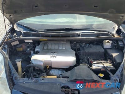 Zdjęcie 12 z 13 samochodu: 2010 TOYOTA SIENNA XLE VIN:5TDYK4CC0AS329662 - miniatura