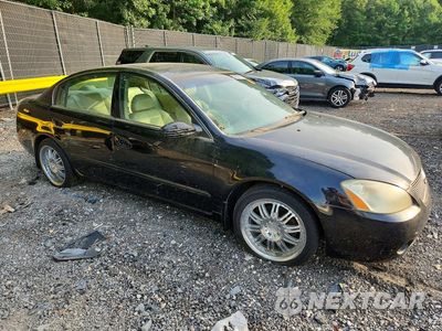 Czwarte zdjęcie samochodu z boku: 2002 NISSAN ALTIMA 2.5 VIN:1N4AL11D42C275686 - miniatura