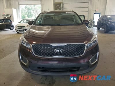 Piąte zdjęcie samochodu w środku: 2016 KIA SORENTO LX VIN:5XYPGDA33GG080084 - miniatura