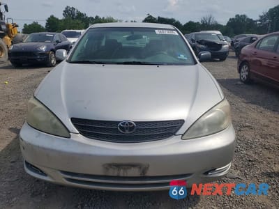 Piąte zdjęcie samochodu w środku: 2002 TOYOTA CAMRY LE VIN:4T1BE32K92U091612 - miniatura