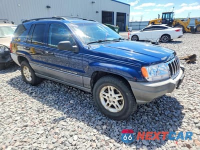 Czwarte zdjęcie samochodu z boku: 2002 JEEP GRAND CHEROKEE LAREDO VIN:1J4GW48S32C286691 - miniatura
