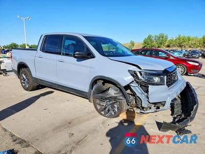 Czwarte zdjęcie samochodu z boku: 2023 HONDA RIDGELINE SPORT VIN:5FPYK3F18PB067947 - miniatura