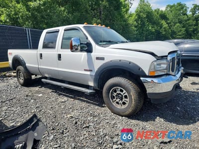 Czwarte zdjęcie samochodu z boku: 2004 FORD F350 SRW SUPER DUTY VIN:1FTSW31P54EC53294 - miniatura