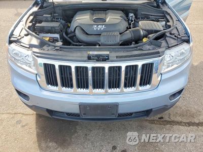 Zdjęcie 11 z 12 samochodu: 2012 JEEP GRAND CHEROKEE LAREDO VIN:1C4RJFAG2CC242679 - miniatura