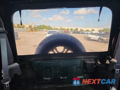 Zdjęcie 10 z 13 samochodu: 1999 JEEP WRANGLER / TJ SE VIN:1J4FY29P4XP460448 - miniatura