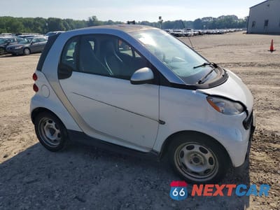 Czwarte zdjęcie samochodu z boku: 2015 SMART FORTWO PURE VIN:WMEEJ3BAXFK795745 - miniatura