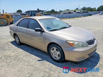 Czwarte zdjęcie samochodu z boku: 2002 TOYOTA CAMRY LE V6 VIN:4T1BF32K42U026454 - miniatura