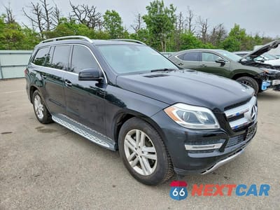 Czwarte zdjęcie samochodu z boku: 2014 MERCEDES-BENZ GL 450 4MATIC VIN:4JGDF7CE0EA381488 - miniatura