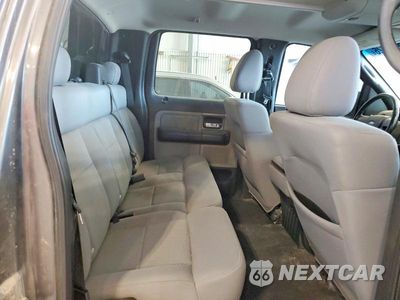 Zdjęcie 10 z 12 samochodu: 2004 FORD F-150 VIN:1FTPW14504FA29350 - miniatura