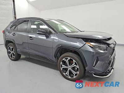 Czwarte zdjęcie samochodu z boku: 2024 TOYOTA RAV4 PRIME XSE VIN:JTMEB3FV5RD217246 - miniatura