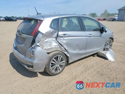 Trzecie zdjęcie samochodu z tyłu: 2020 HONDA FIT EX VIN:3HGGK5H88LM708340 - miniatura