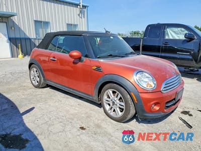 Czwarte zdjęcie samochodu z boku: 2011 MINI COOPER VIN:WMWZN3C51BTZ78328 - miniatura