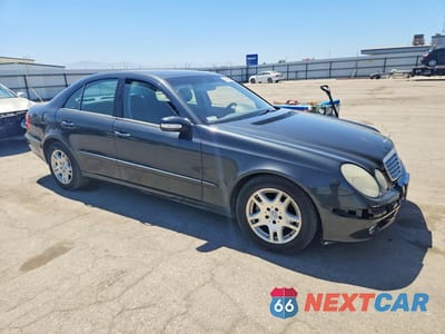 Czwarte zdjęcie samochodu z boku: 2003 MERCEDES-BENZ E 320 VIN:WDBUF65J13A294817 - miniatura
