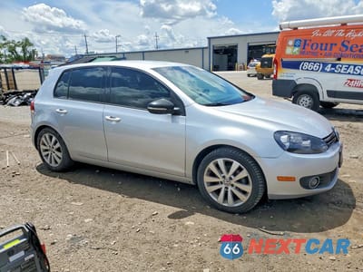 Czwarte zdjęcie samochodu z boku: 2014 VOLKSWAGEN GOLF VIN:WVWDM7AJ4EW007401 - miniatura