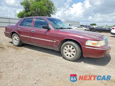 Czwarte zdjęcie samochodu z boku: 2005 MERCURY GRAND MARQUIS LS VIN:2MEFM75W95X664082 - miniatura