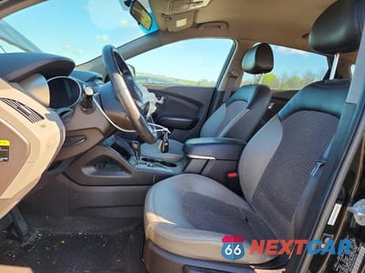 Zdjęcie 7 z 14 samochodu: 2012 HYUNDAI TUCSON GLS VIN:KM8JUCAC6CU491301 - miniatura