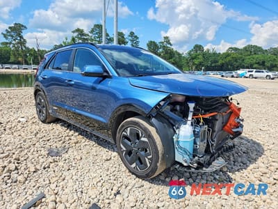 Czwarte zdjęcie samochodu z boku: 2024 KIA NIRO WIND VIN:KNDCR3L16R5092305 - miniatura