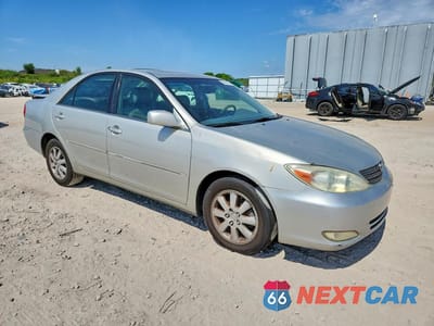 Czwarte zdjęcie samochodu z boku: 2003 TOYOTA CAMRY XLE VIN:4T1BE32K33U780269 - miniatura