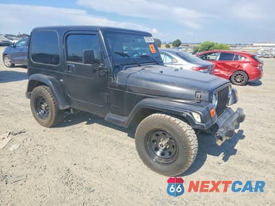 Czwarte zdjęcie samochodu z boku: 2003 JEEP WRANGLER COMMANDO VIN:1J4FA39S33P323221 - miniatura