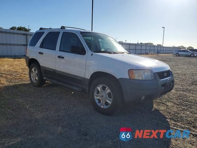 Czwarte zdjęcie samochodu z boku: 2003 FORD ESCAPE XLT VIN:1FMYU93103KE07031 - miniatura