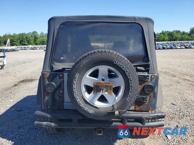 Zdjęcie 6 z 12 samochodu: 2001 JEEP WRANGLER / TJ SPORT VIN:1J4FA49S01P357071 - miniatura