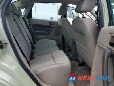 Zdjęcie 10 z 13 samochodu: 2010 FORD FOCUS SE VIN:1FAHP3FN3AW201799 - miniatura
