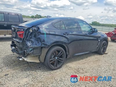 Trzecie zdjęcie samochodu z tyłu: 2019 BMW X6 M VIN:5YMKW8C50KLR38425 - miniatura