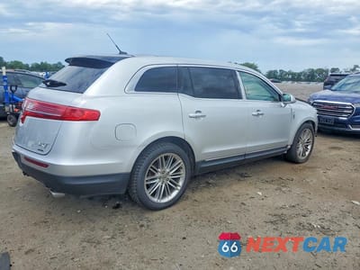 Trzecie zdjęcie samochodu z tyłu: 2016 LINCOLN MKT VIN:2LMHJ5AT7GBL03193 - miniatura